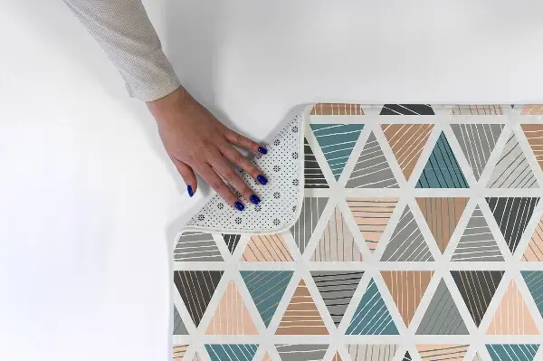 Liten matta Trianglar i ett geometriskt mönster