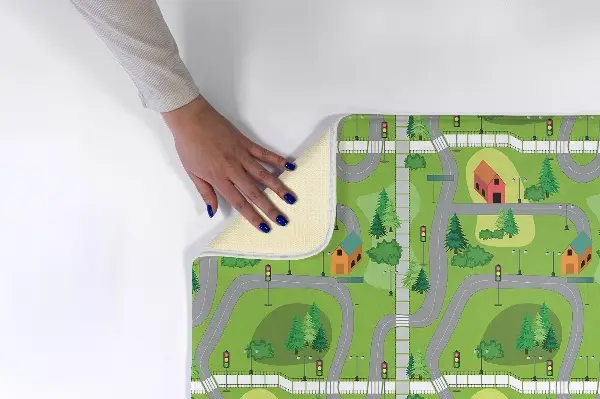 Liten matta Gator och hus i ett grönt landskap
