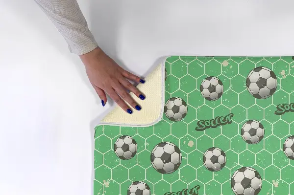 Liten matta Mönster av fotbollar